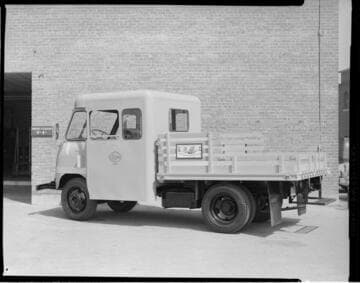 Edison utility truck with extended crew cab, and flatbed in the back