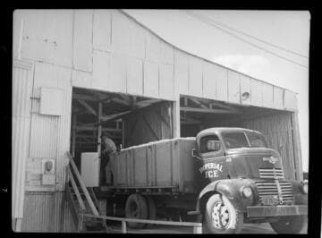 Loading large truck with ice at Imperial Ice Plant