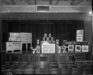 Display of commercial restaurant cooking equipment and food products on the stage the G