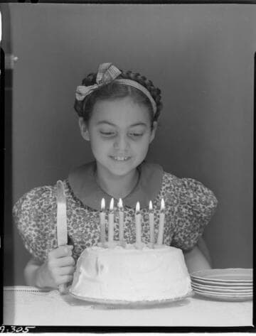 Sonya and birthday cake for March 1940 Electric Times Cover
