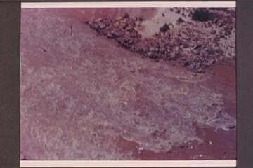 One of the Nevills sadirons in the tongue of Badger Creek Rapids; Lees Ferry gauge: 35,800 cfs