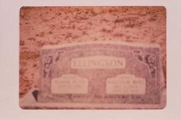 Ellingson headstone in Elgin Cemetery.  Probably Malcolm B. Ellingson is buried there.  He is known on the River as Moki-Mac.  (out of focus)