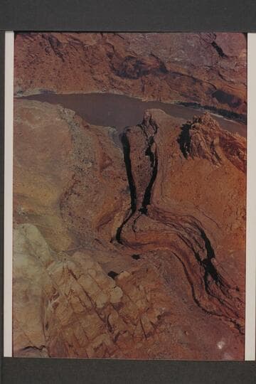 Northwest to Glen Canyon at Mile 101.7.  Approximate gauge:  23,000 cfs