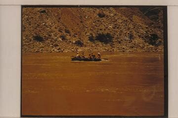 The Spencer party near Diamond Creek.  The operation is following the Moki Mac technique with inflated boat and paddles