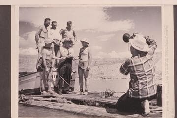 Belknap photographing the crew of the "Esmeralda" at the end of her first traverse of the Marble and Grand Canyons