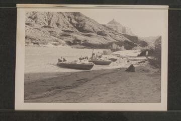 Boats moored at Mile 66 camp;  Temple Butte in distance