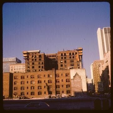 YMCA building and neighboring hotel being wrecked