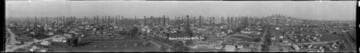 Signal Hill oil field, facing north and east, with some individual derricks labeled. October 11, 1922