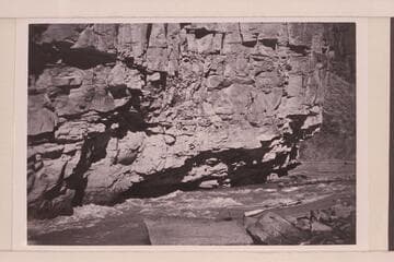 Buzz Holmstrom's boat in portage at lower Disaster Rapid