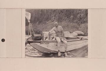 "Ed" Hudson posed on his boat "Esmeralda"; Tapeats Creek