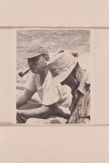 Don Ashbaugh and Randall Henderson on the motor-boat on Lake Mead; end of 1947 traverse of Grand Canyon