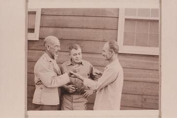 Meeting with Willis Johnson (center) and Harry Aleson (right) at Dragerton, Utah [Marston at left]