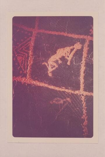 Kokopelli.  Hum-[sic] backed flute player.  Petroglyph at foot of Trail Canyon on the San Juan River