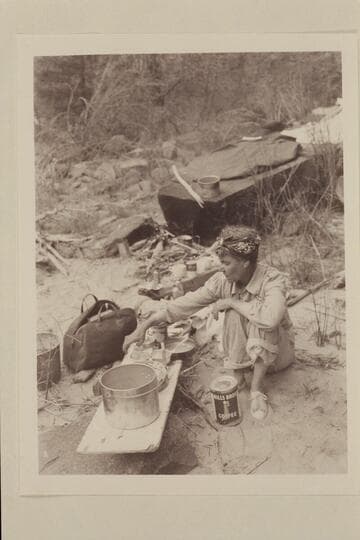 Margaret Marston in camp at Snaggle-Tooth Rapid on the Dolores River