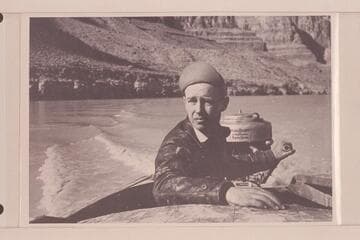 Bering Monroe.  Running his 13-ft. outboard which was powered with a 1940 16HP Evinrude motor