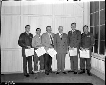 Six men with EEI certificates