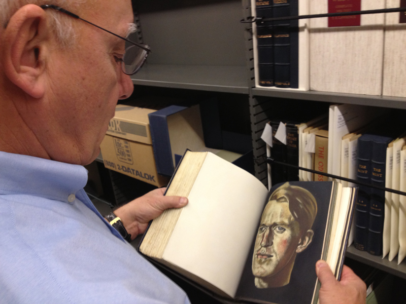 Curator Alan Jutzi holds The Huntington's copy of the 1926 edition of
Seven Pillars of Wisdom